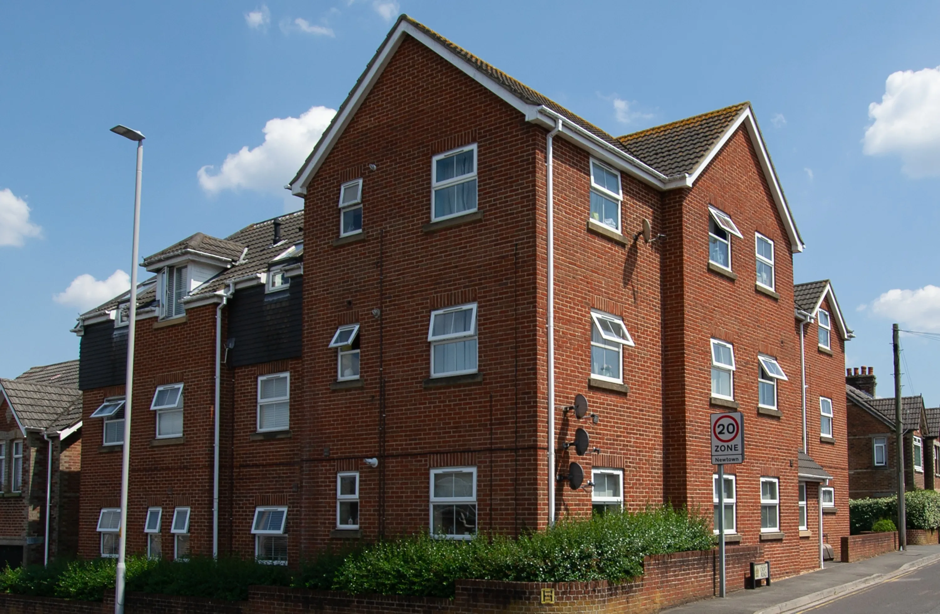 Sea View Road, 24 to 28: a three-storey red brick block of flats